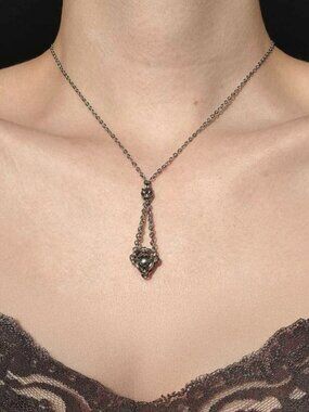 Classic vintage antique silver basket necklace with a small silver chain